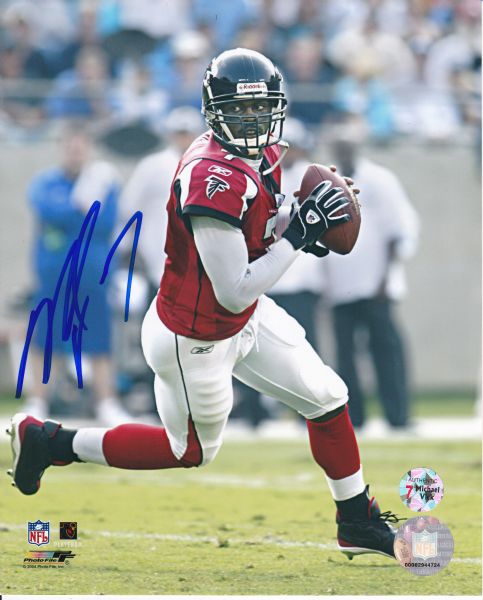 LOT OF 4 MICHAEL VICK SIGNED 8X10 PHOTOS
